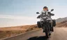 Kove 625X PRO MAX con maletas en carretera